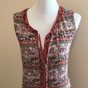 Peplum hem sleeveless top